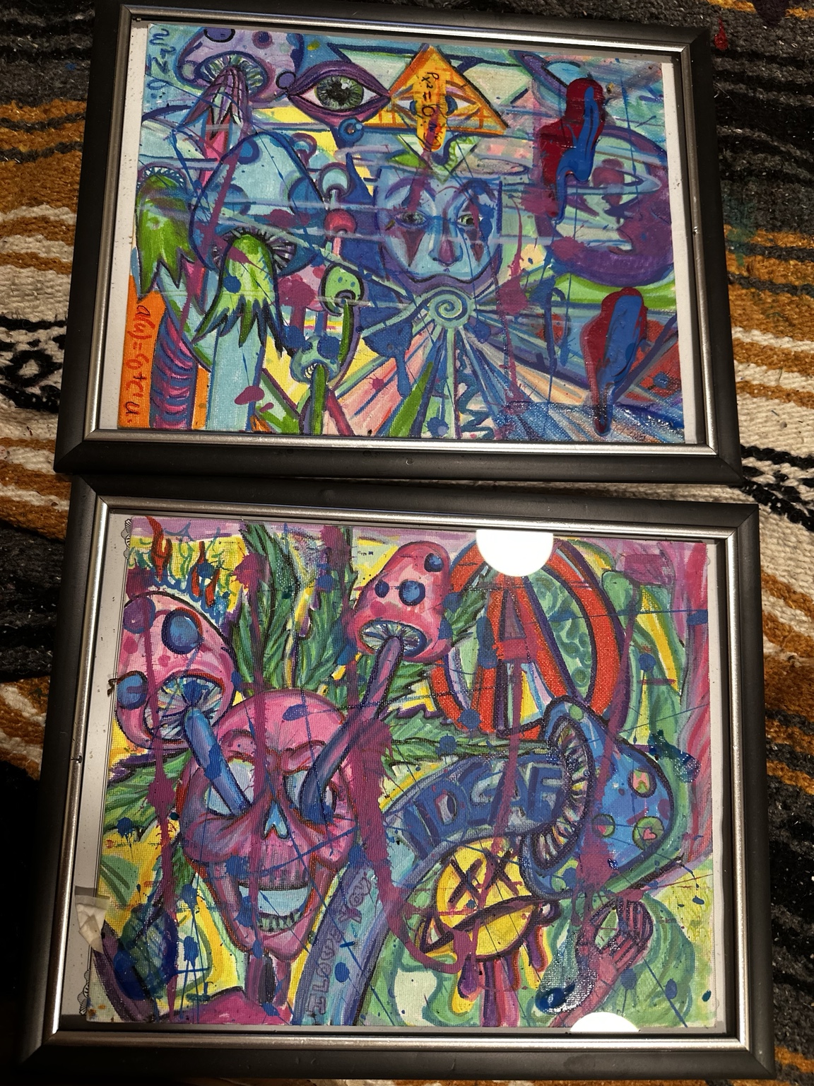 Two framed colorful paintings
